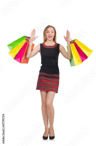 Woman after shopping spree on white