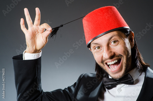 Man in traditional turkish hat and dress