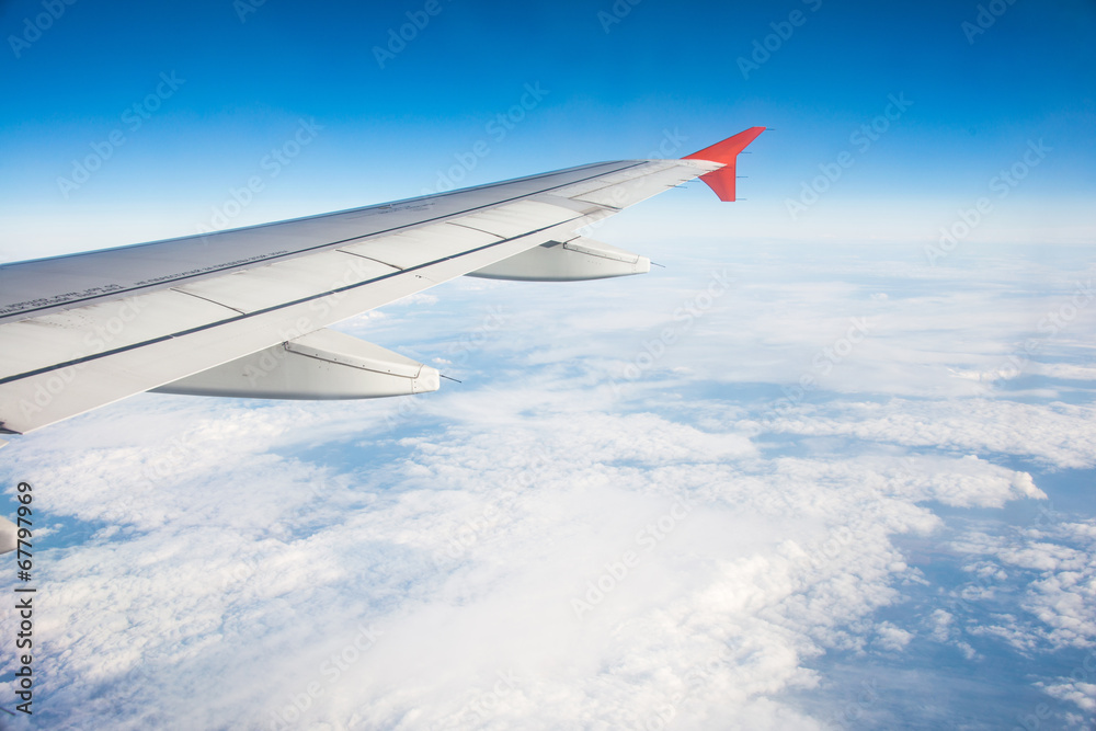 Airplane wing out of window Airplane wing out of window