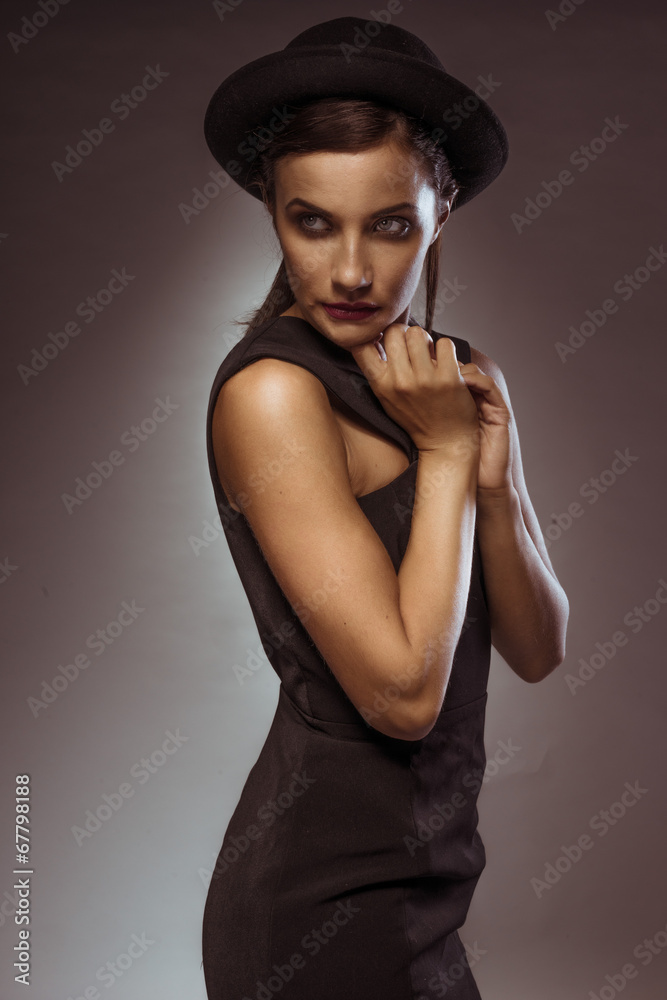 Elegant beautiful woman with downcast eyes Elegant beautiful woman with downcast eyes