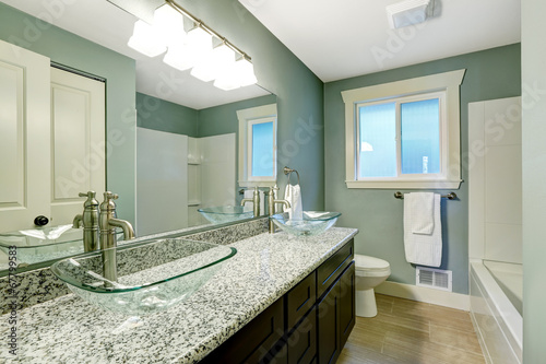 Modern bathroom interior in soft aqua color