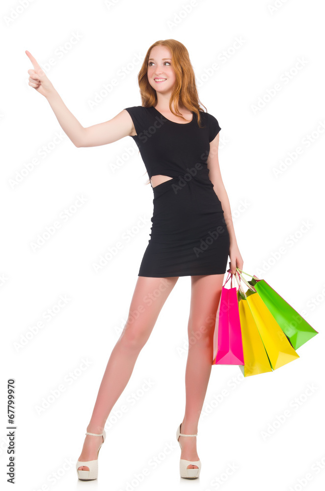 Woman with shopping bags isolated on white