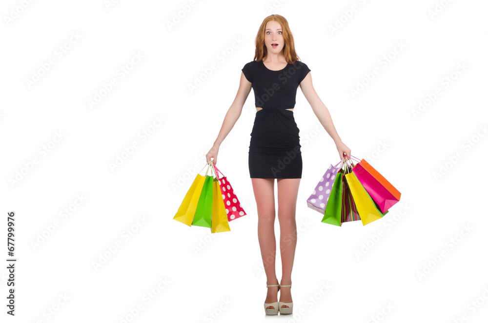 Woman after shopping spree on white