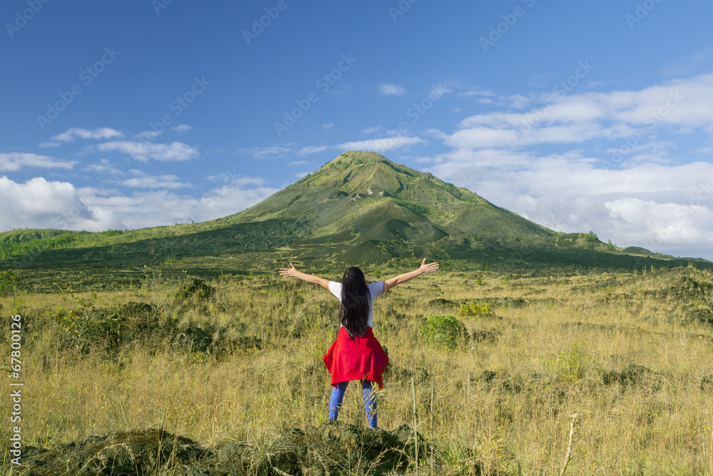 Woman enjoying fresh mountain air 1