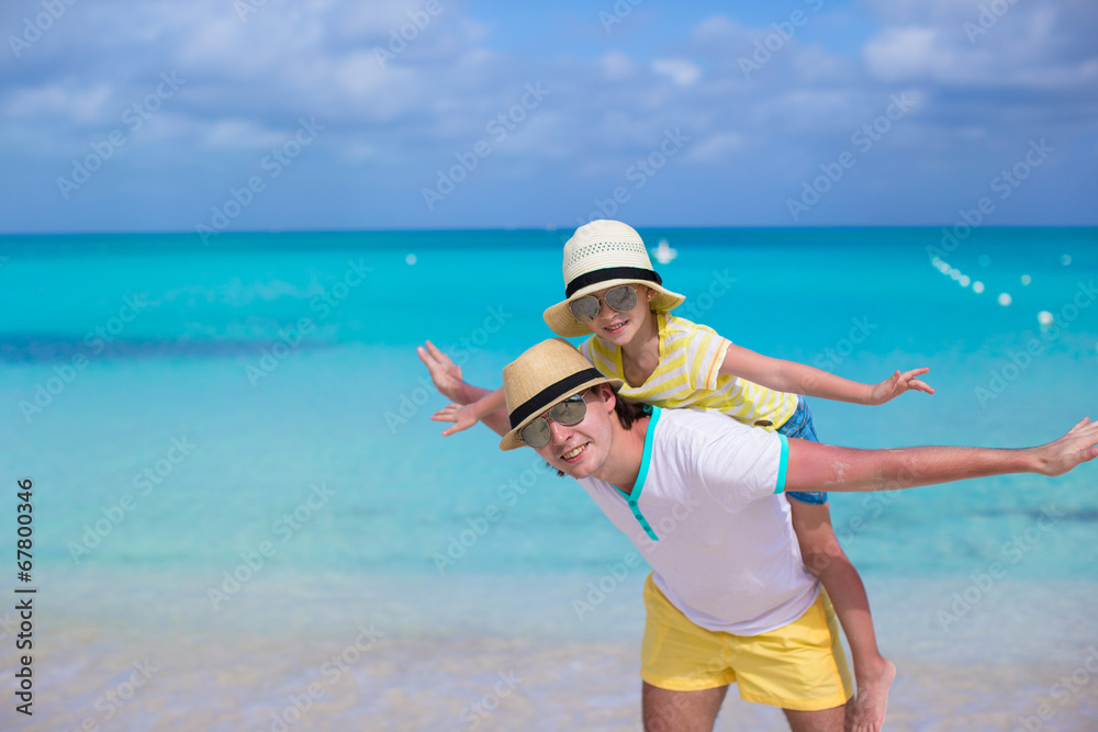 Happy father and his adorable little daughter have fun at Happy father and his adorable little daughter have fun at