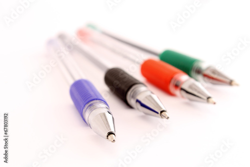 Four ballpoints isolated on white