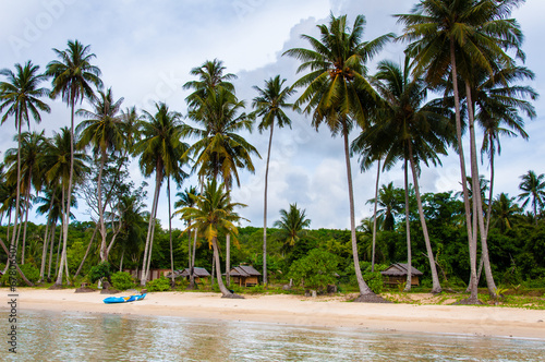 Exotic tropical beach with white sand and blue waters