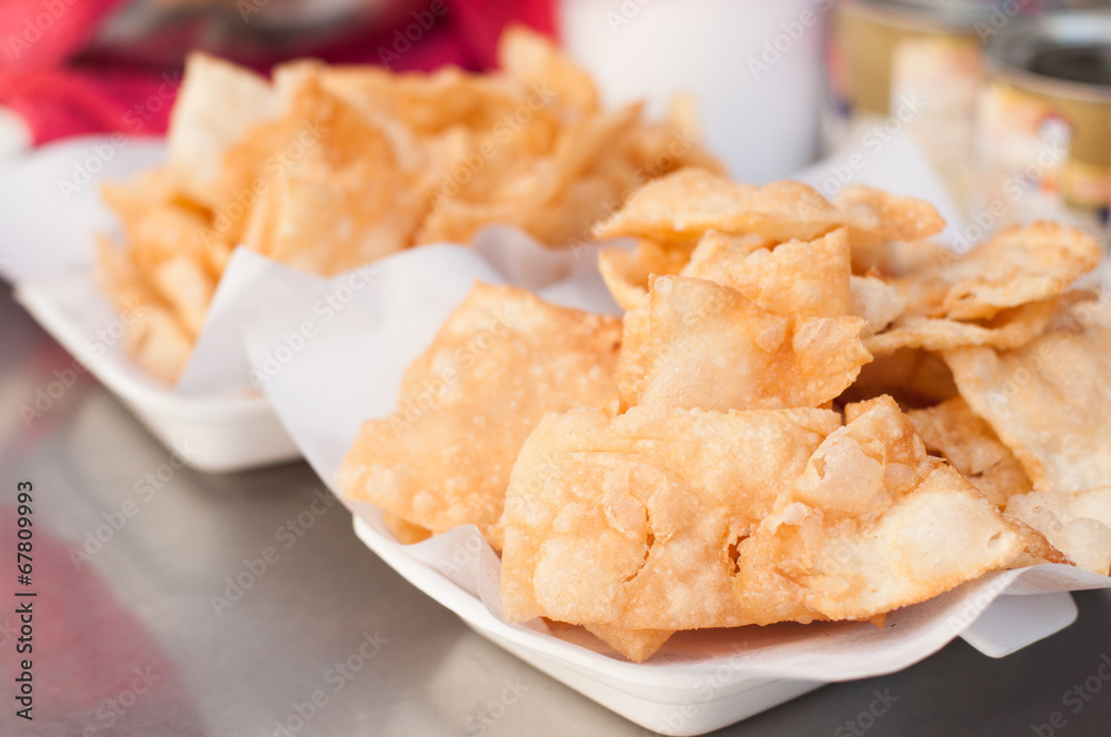 Dessert style of fried Roti with banana cooking on the street in