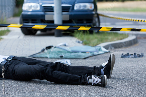 Fotografie Man on the street after accident