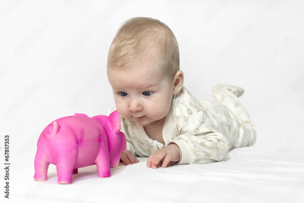 baby playing with a toy baby playing with a toy