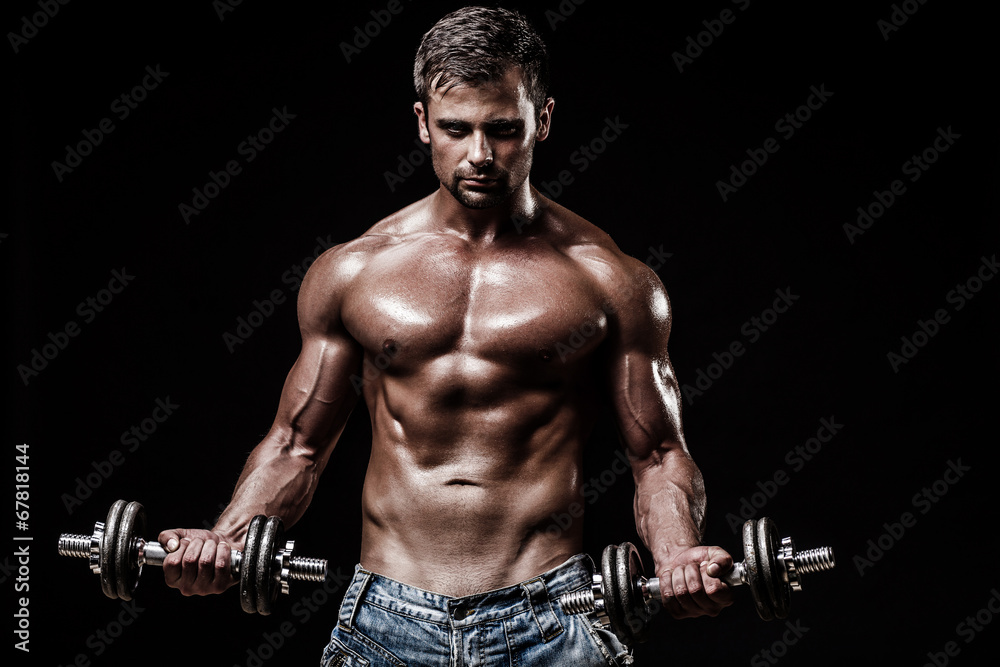 athletic young man on black background athletic young man on black background