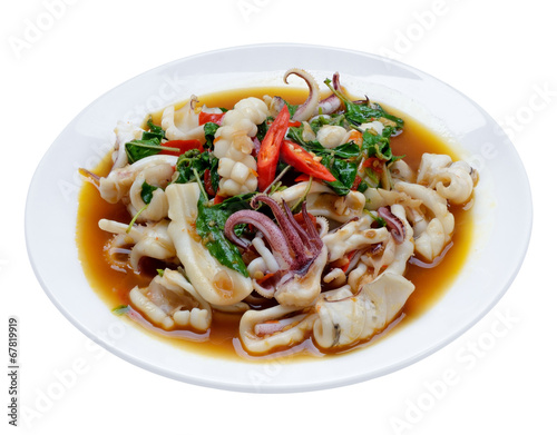 stir fried squid with chilli and basil isolated on white