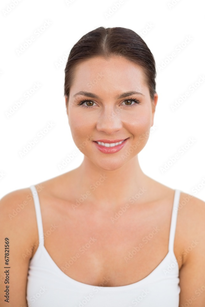 Peaceful brunette smiling at camera Peaceful brunette smiling at camera