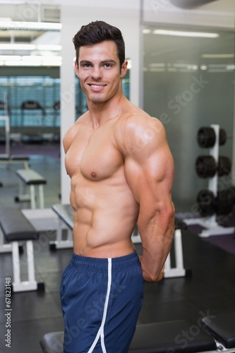 Shirtless muscular man posing in gym © WavebreakmediaMicro