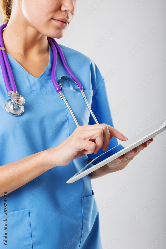 beautiful young female medical intern with tablet computer beautiful young female medical intern with tablet computer