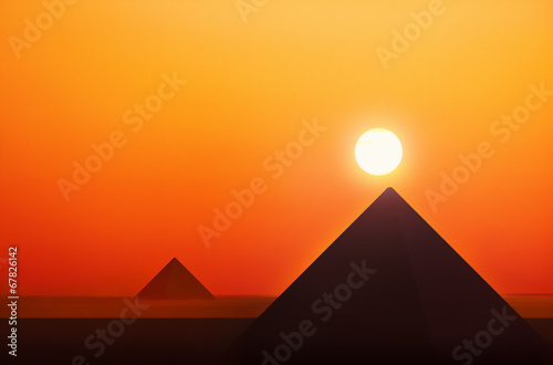 Ancient pyramids in sunset