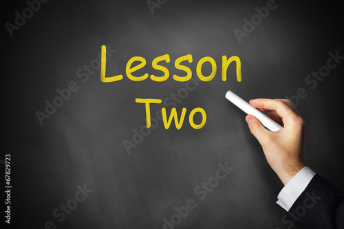 Canvas Print hand writing lesson two on chalkboard