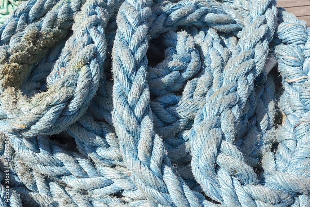Thick ropes on a wooden sailing ship floor