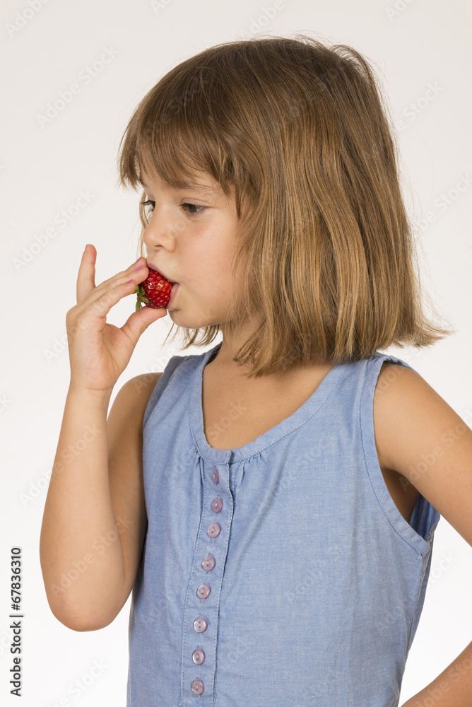 Little Girl Eating Strawberry