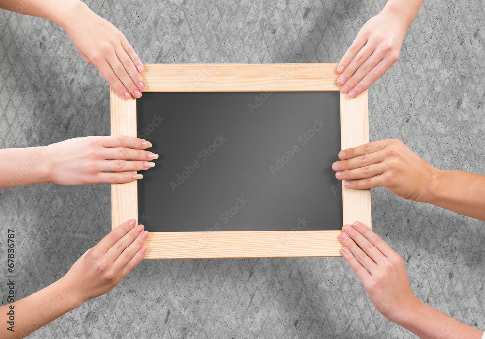 Hands holding frame Hands holding frame