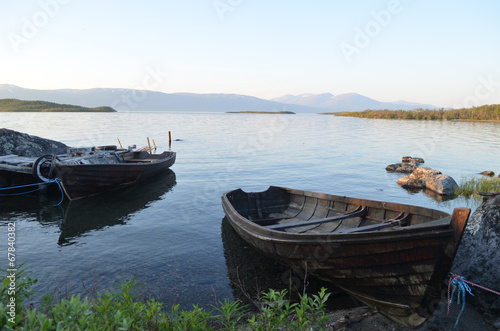 wooden rowing boat in Tornetr  sk lake in Sweden