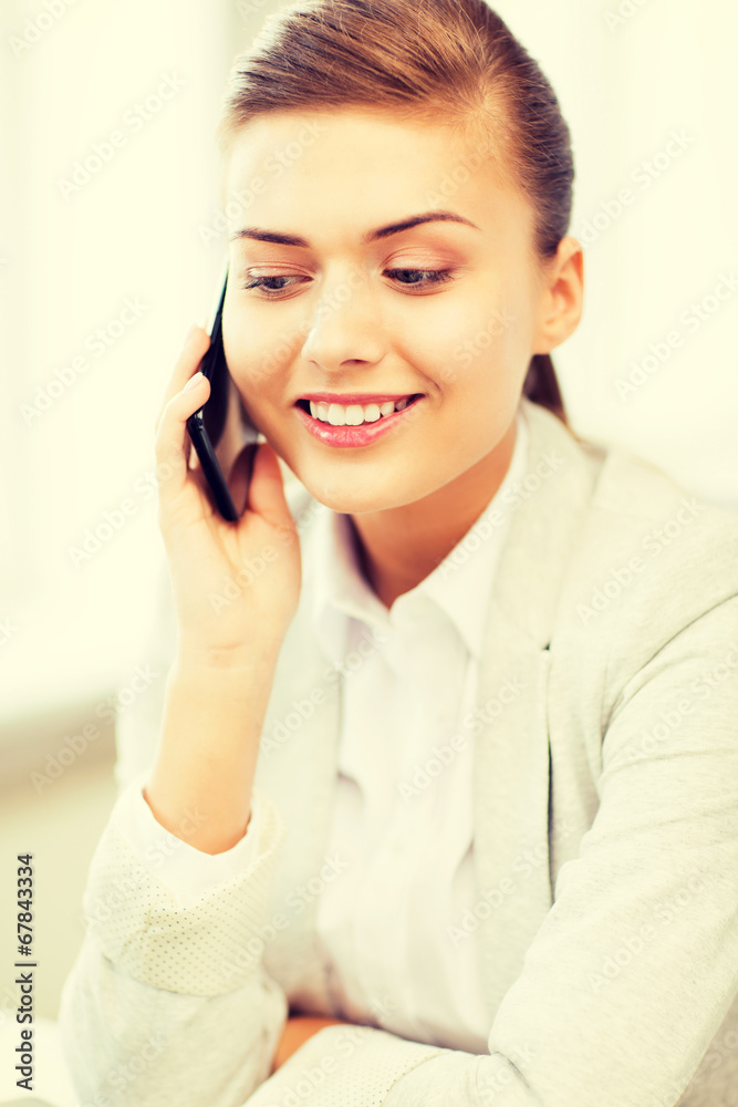 businesswoman with smartphone in office businesswoman with smartphone in office