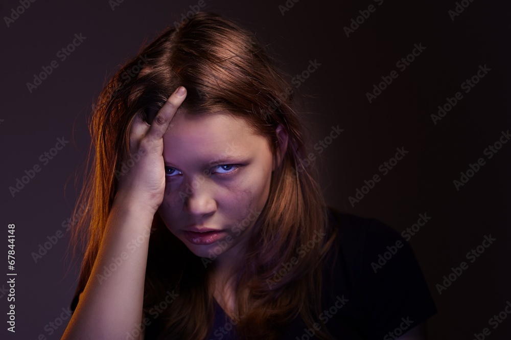 Angry teen girl in hood Angry teen girl in hood