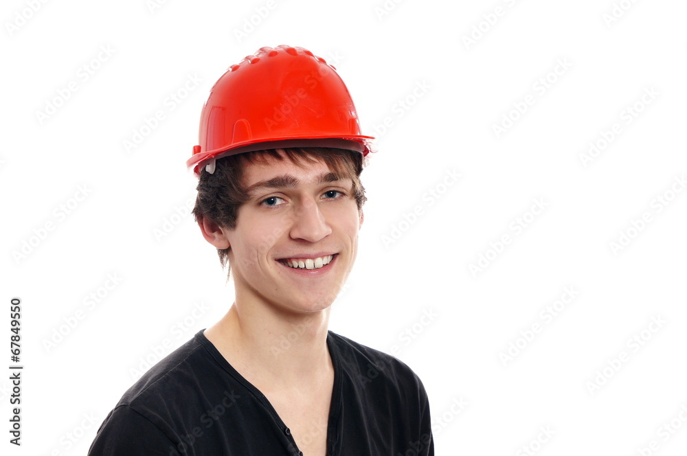 Portrait of young smiling man in a protective helmet Portrait of young smiling man in a protective helmet