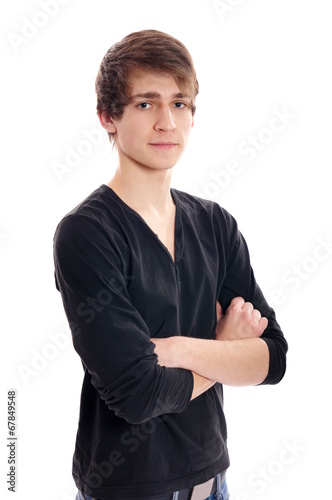 Portrait of young smiling man in black shirt standing