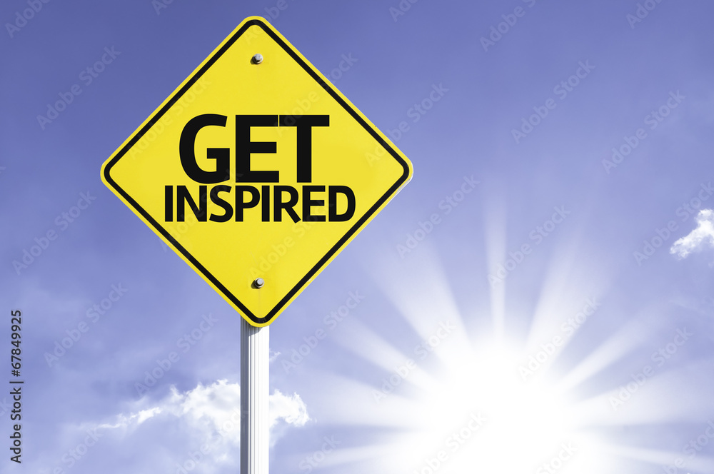 Get Inspired road sign with sun background Get Inspired road sign with sun background