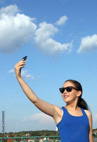 girl make selfie on a smart phone
