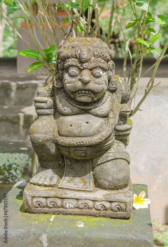 Statue at Goa Gajah temple in Bali photo