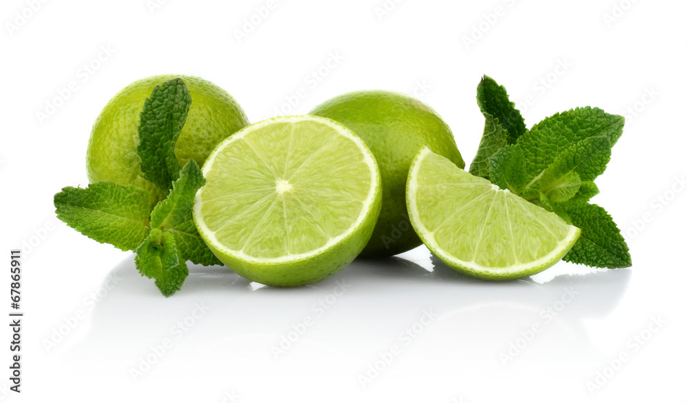 Three sliced limes with mint isolated on a white background Three sliced limes with mint isolated on a white background