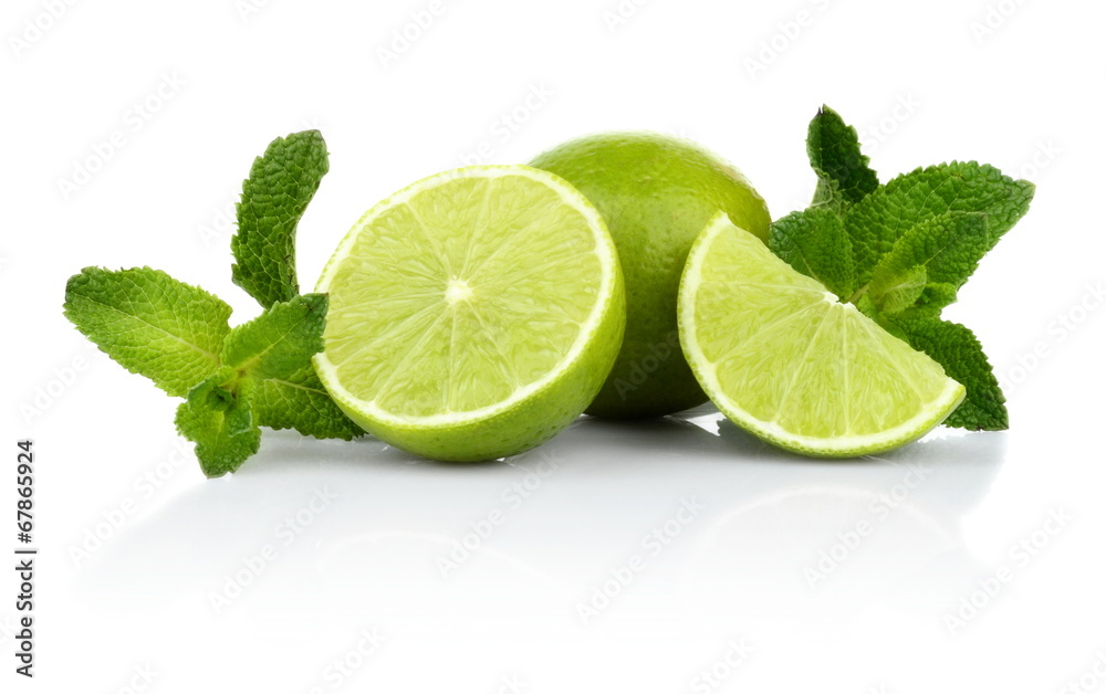 Three sliced limes with mint isolated on a white background Three sliced limes with mint isolated on a white background