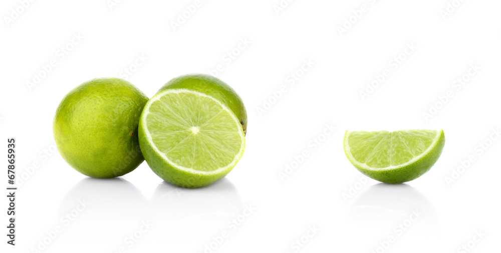 Three sliced limes isolated on a white background