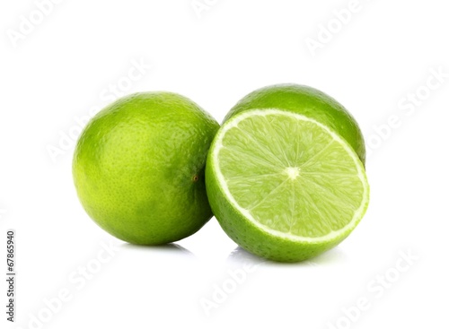 Three sliced limes isolated on a white background