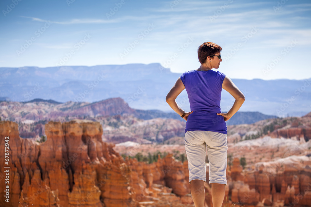 Tourist admiring nature in Bryce Canyon National Park