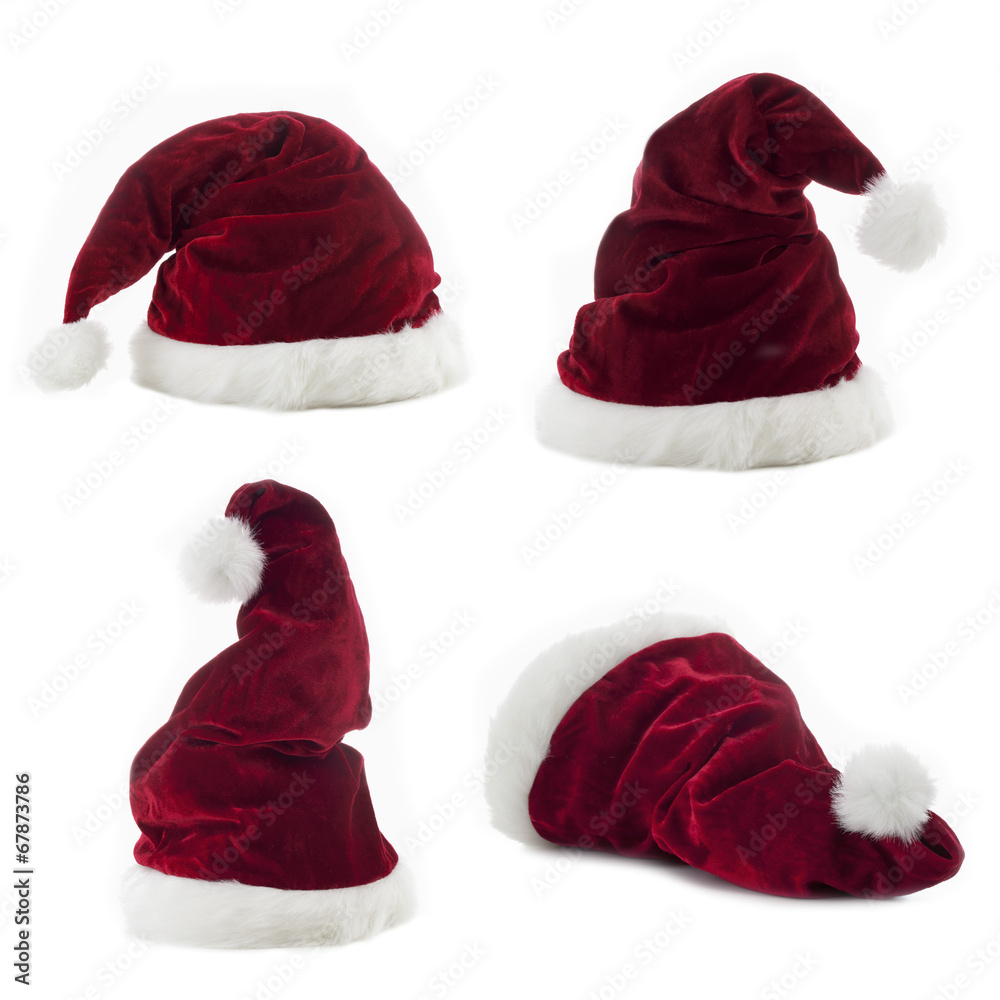 Vier Nikolausmützen auf weißem Untergrund Vier Nikolausmützen auf weißem Untergrund
