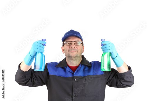 Man in workwear with a spray.