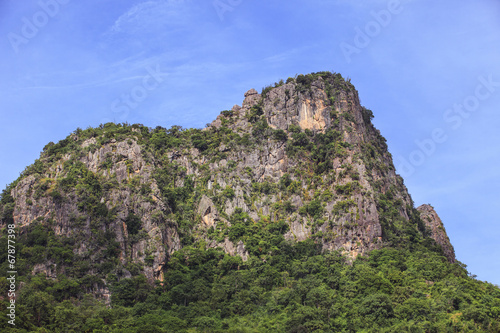 lime stone mountain against blue sky