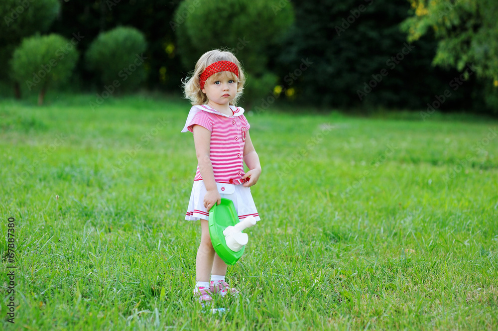 Portrait of adorable child girl playing outdoors Portrait of adorable child girl playing outdoors
