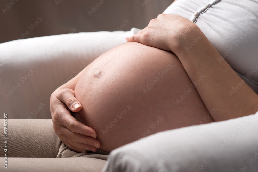 Close-up pregnant woman tummy