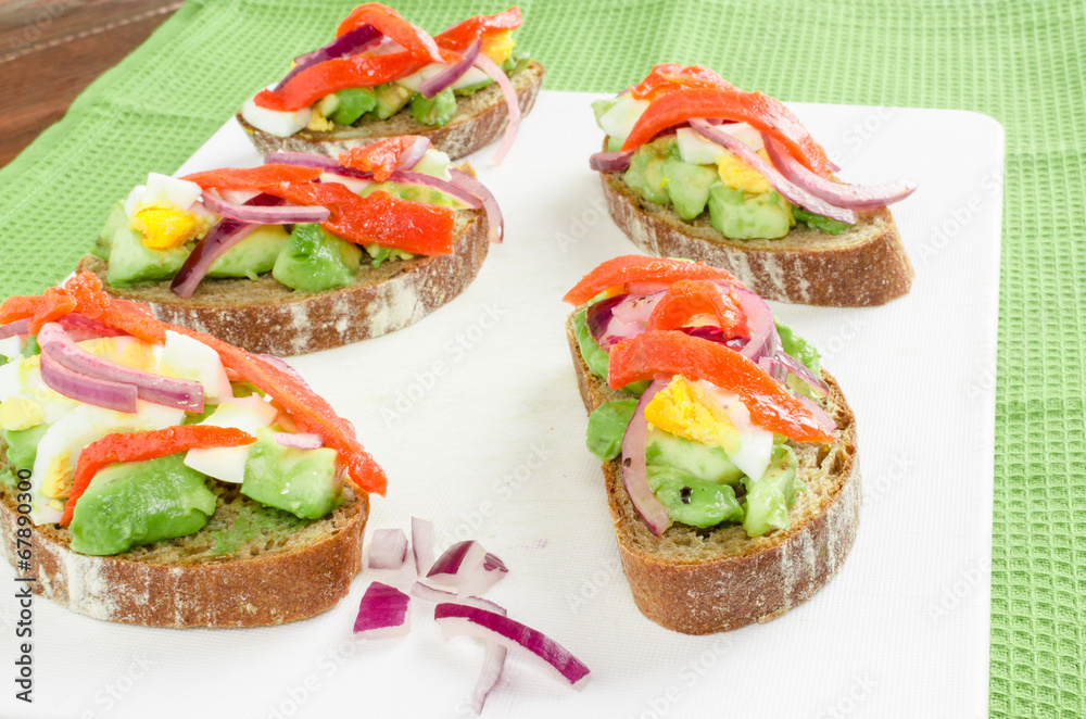 Brown bread with avocado, smoked salmon, boiled egg Brown bread with avocado, smoked salmon, boiled egg