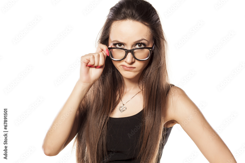 suspicious angry young woman on white background suspicious angry young woman on white background