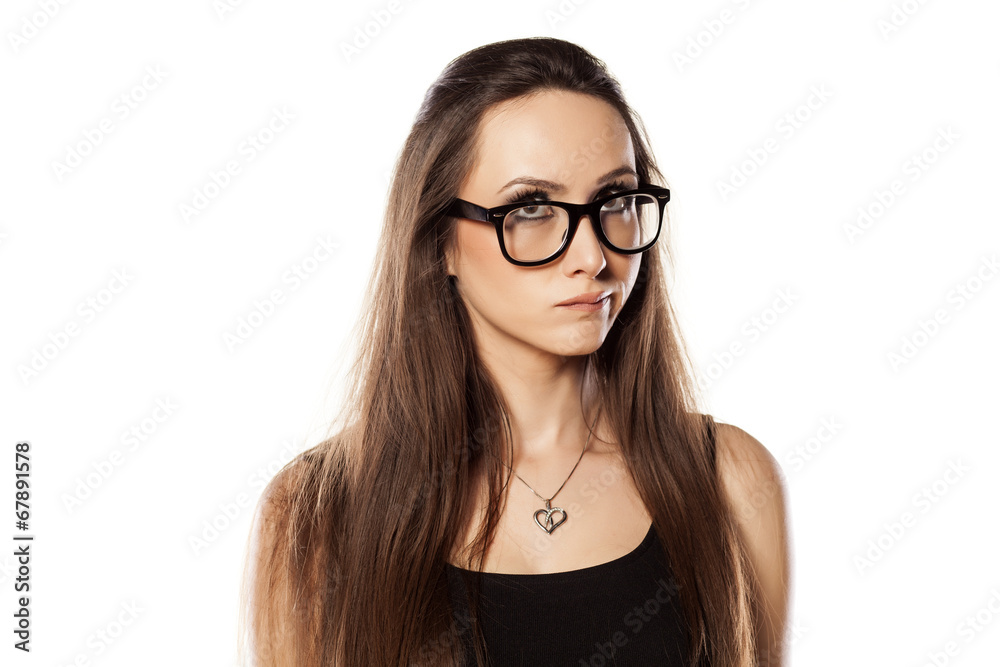 unsure young woman is thinking and looking up unsure young woman is thinking and looking up