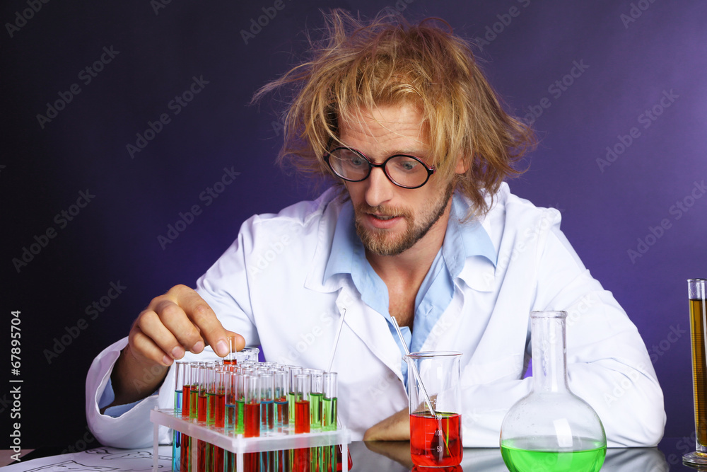 Crazy scientist working in laboratory Crazy scientist working in laboratory