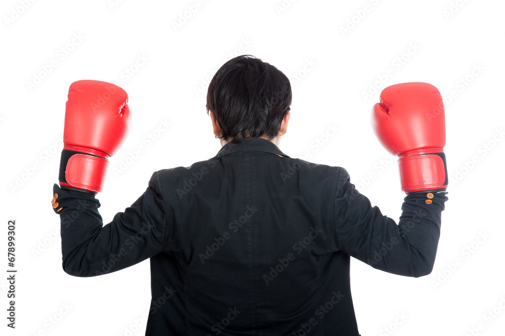 Back of Asian businessman wear boxing gloves Back of Asian businessman wear boxing gloves