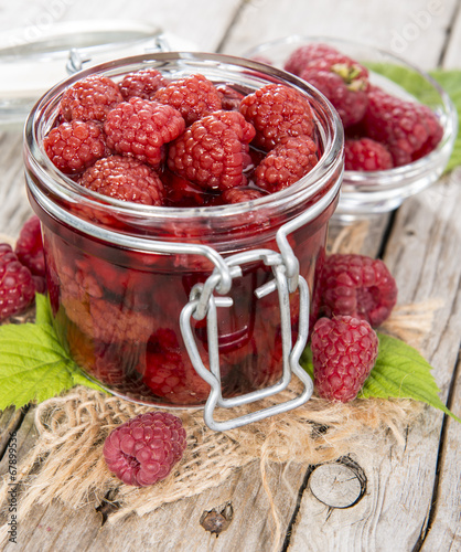 Glass with Canned Raspberries