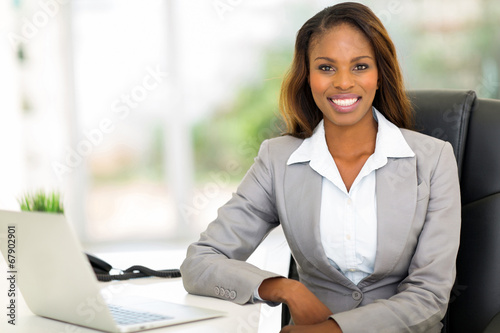 young afro american businesswoman sitting in office