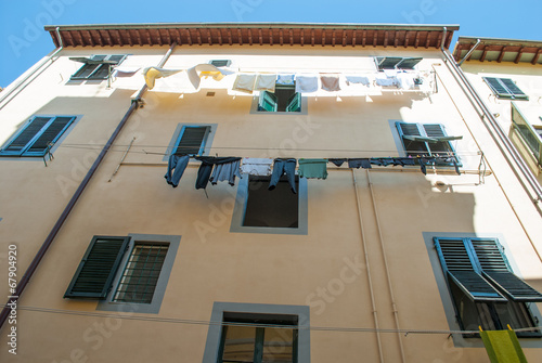 Fotografie Facciata palazzo panni stesi, centro storico, Pisa